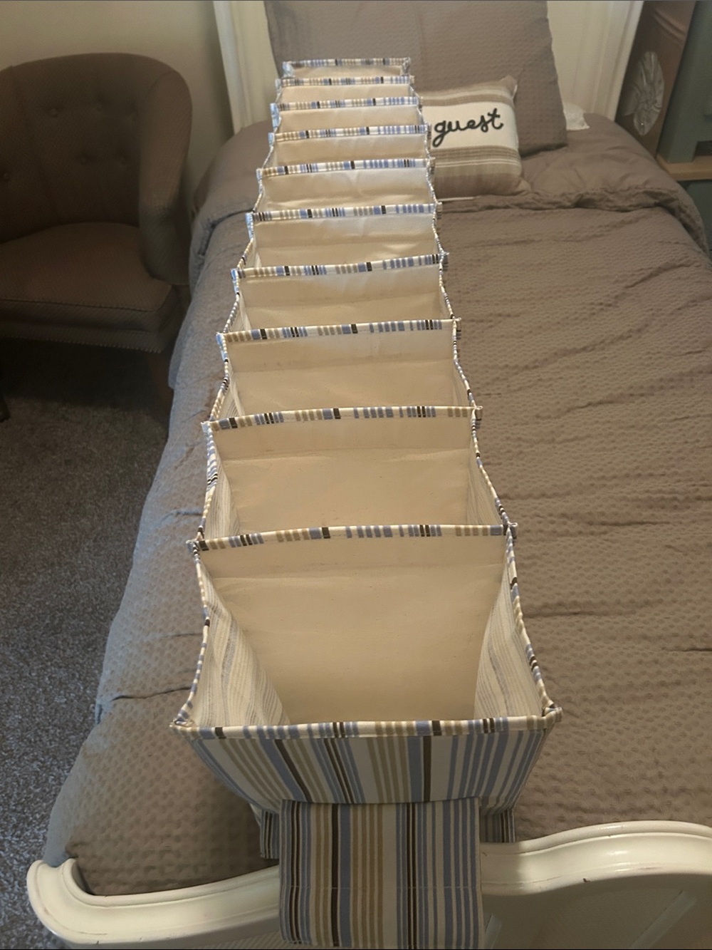 Shoe Box Hanging Closet Organizer holds 10 Shoe boxes nicely.